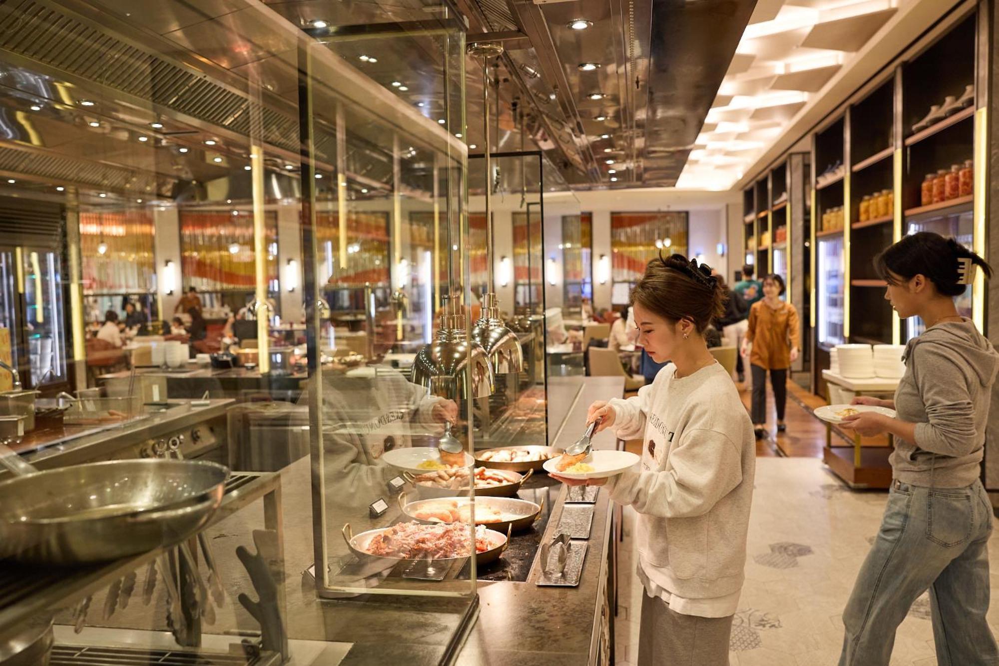 Hotel Grand Hyatt Jeju Exterior foto A buffet at a hotel in Hong Kong